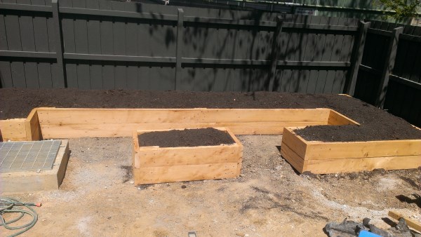 Irregular shaped raised veggie beds designed and built by Yummy Gardens Melbourne