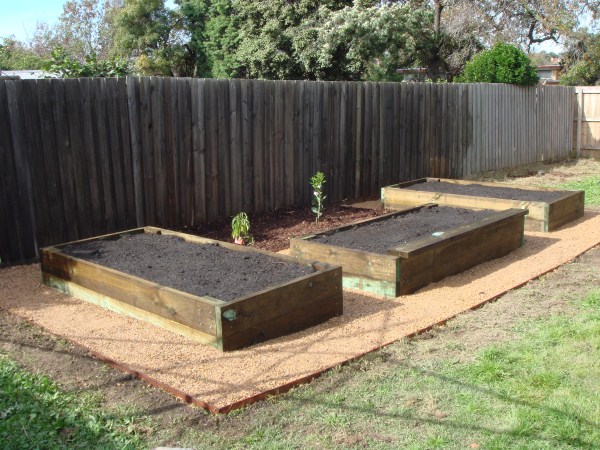 new raised vegie beds and fruit trees by Yummy Gardens Melbourne