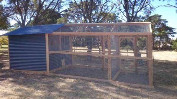 Chicken house with divided pitched roof run by Yummy Gardens Melbourne