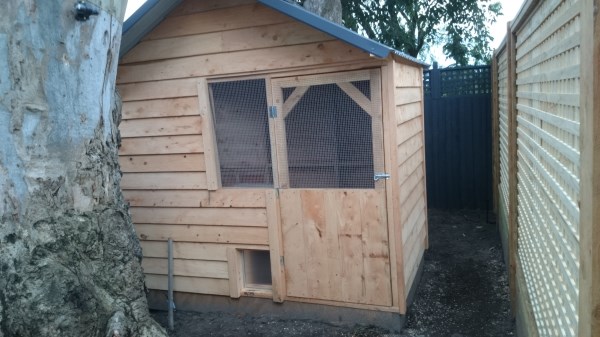 Cypress chicken house with solar door by Yummy Gardens Melbourne