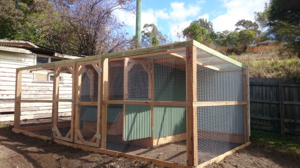 Divided flat roof chook house with divided run by Yummy Gardens Melbourne